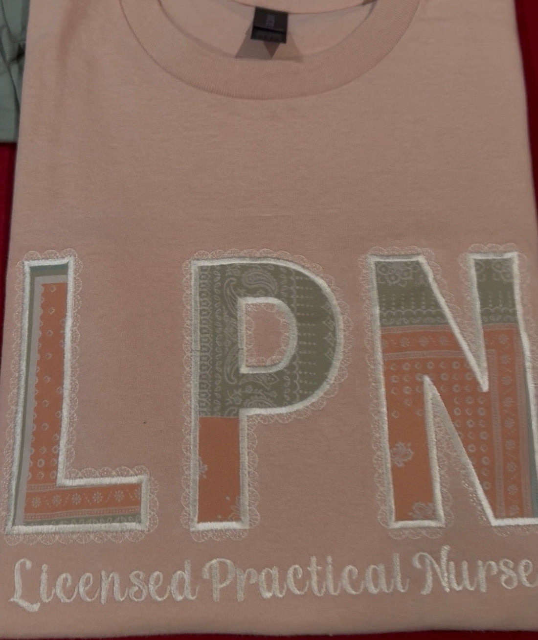 Custom LPN embroidery on scrubs - Licensed Practical Nurse personalized embroidery design with professional lettering - medical scrubs embroidery services