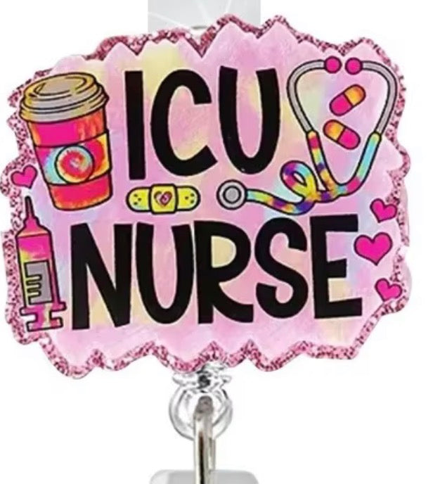 A decorative acrylic badge holder sign that reads 'ICU NURSE' in bold black letters on a pink glittery background, with medical-themed illustrations including a stethoscope, coffee cup, syringe, bandages, and hearts. The sign is mounted on a clear plastic clip.
